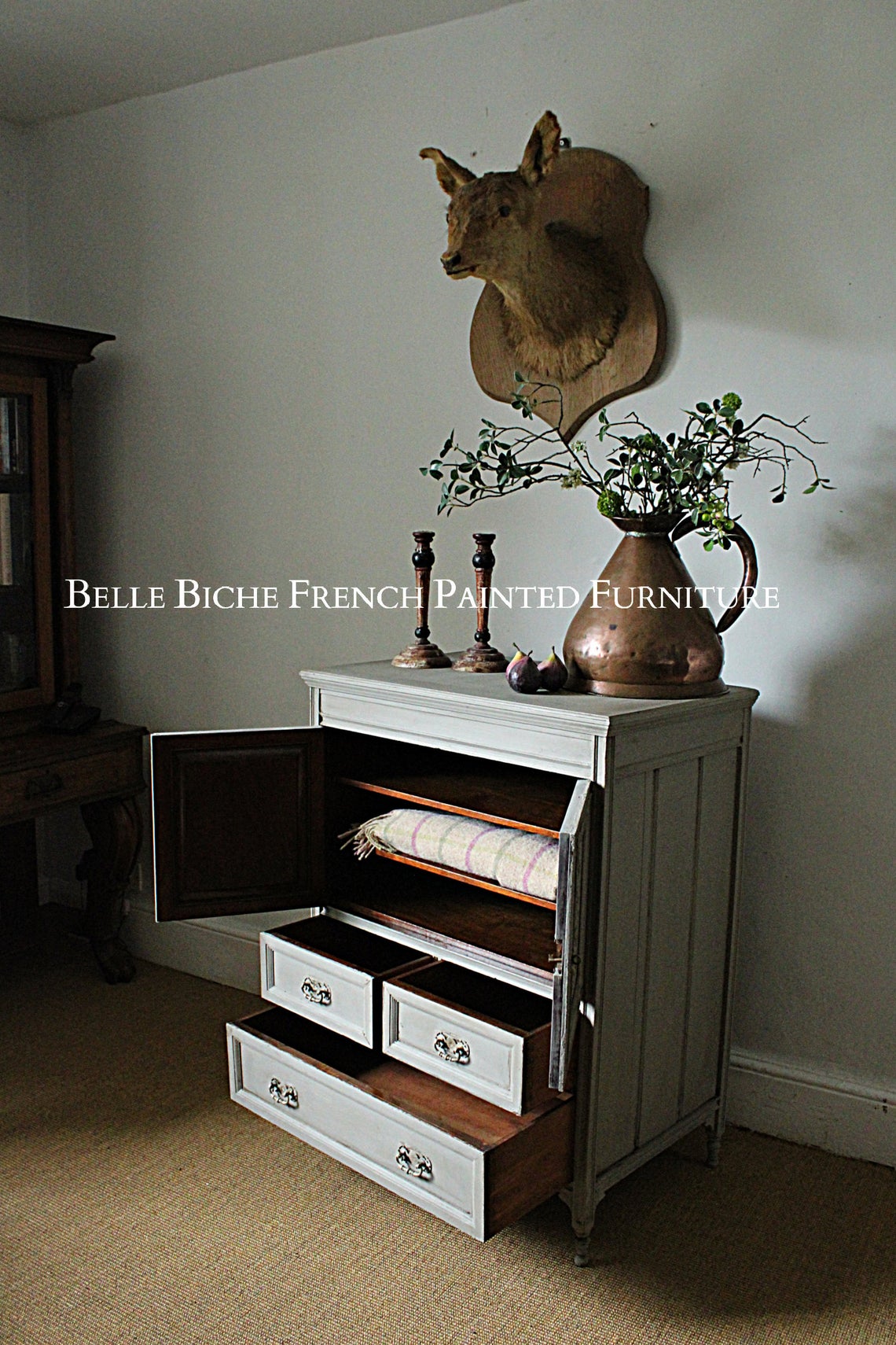 Richly Carved Compact Two Door Antique Side Cabinet