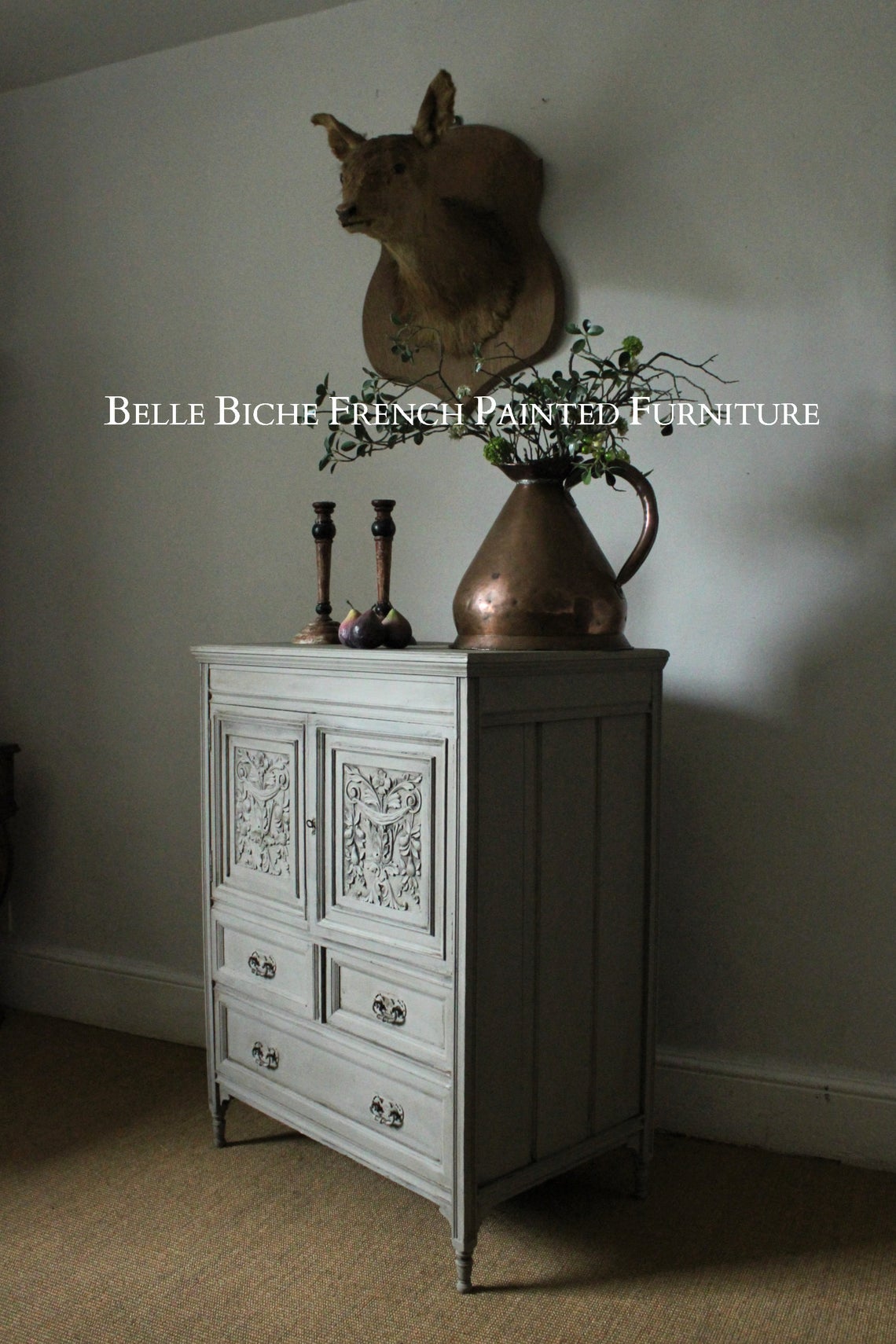 Richly Carved Compact Two Door Antique Side Cabinet